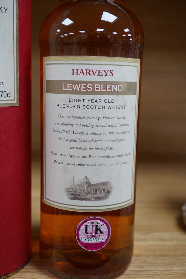 A bottle of Harveys Lewes Blend eight-year old whisky with case. Condition - good